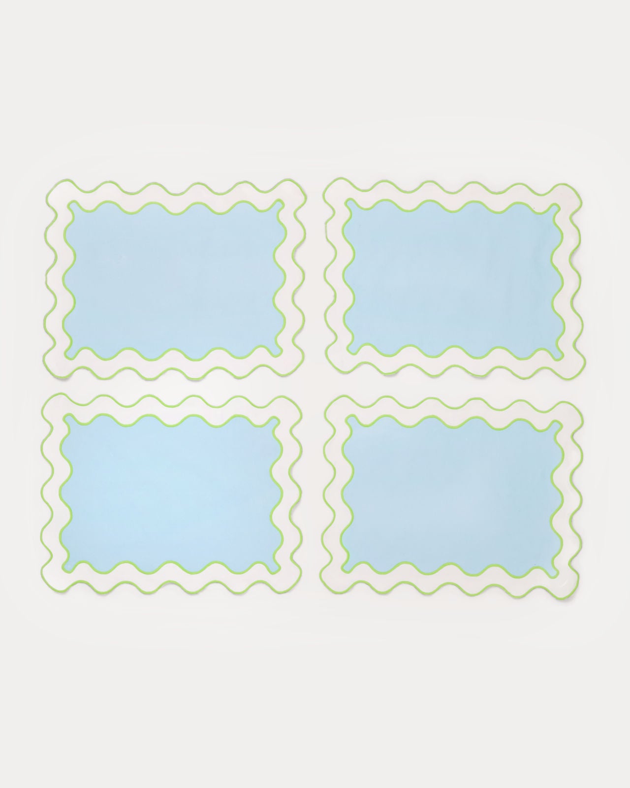 Solid Scalloped Placemat in Bluette