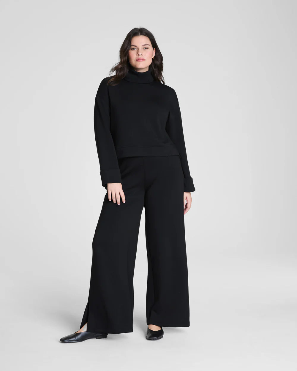 Air Essentials Turtleneck Top in Very Black